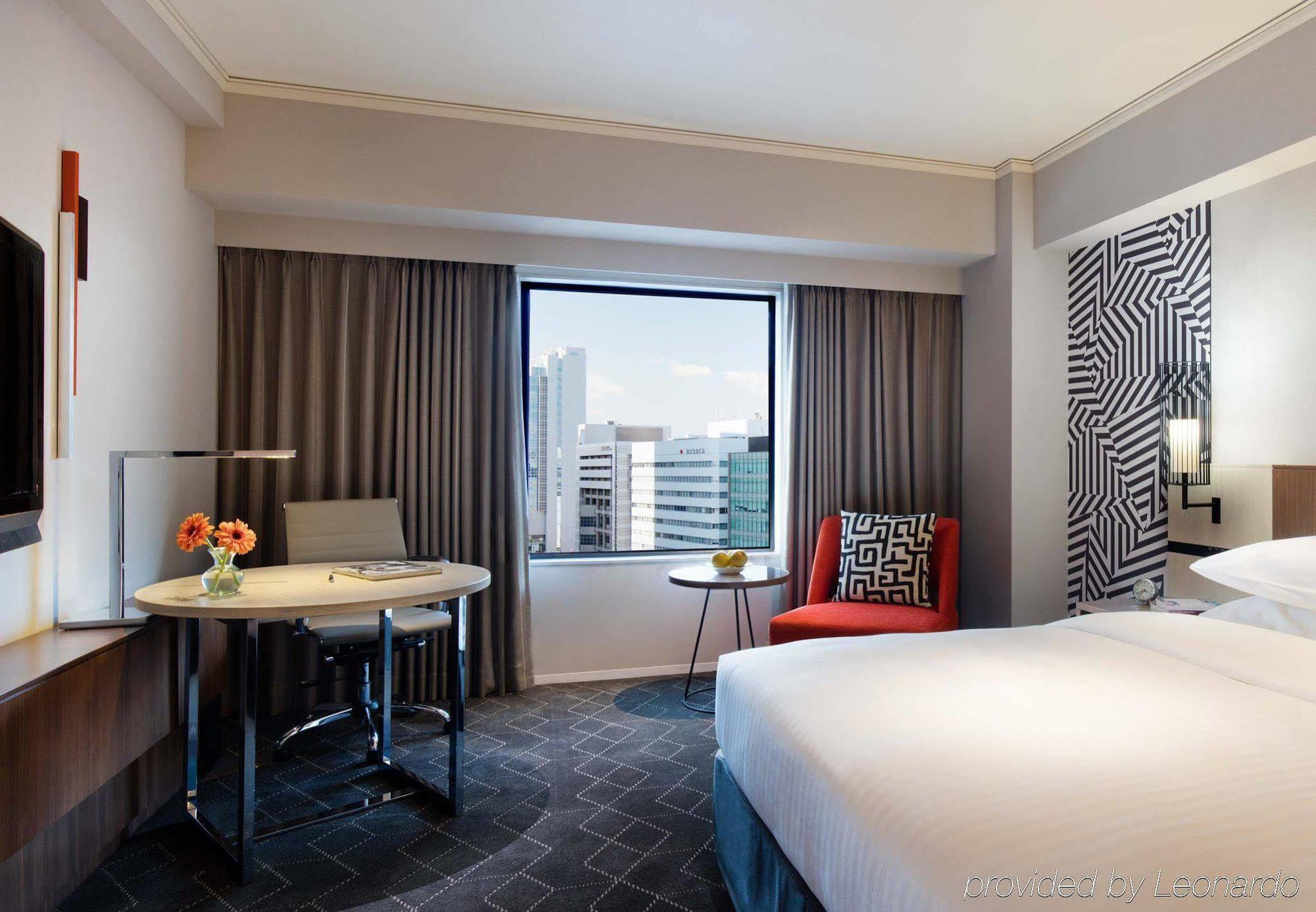 Courtyard By Marriott Shin-Osaka Station Hotel Kültér fotó A guest room at the hotel