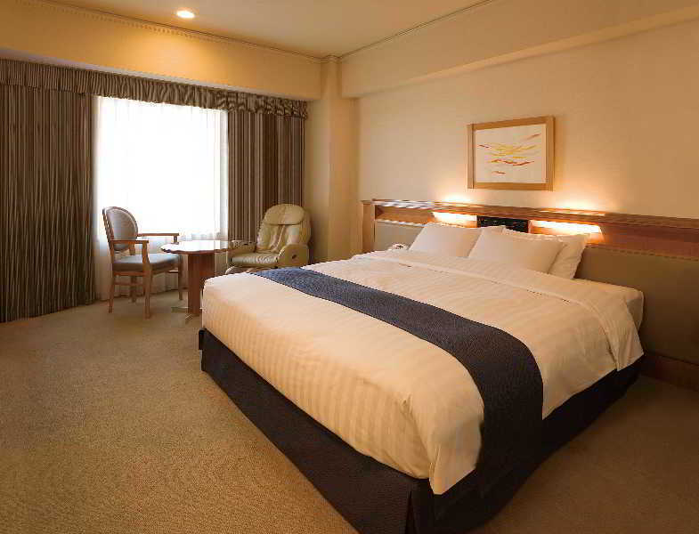 Courtyard By Marriott Shin-Osaka Station Hotel Szoba fotó A room at the hotel