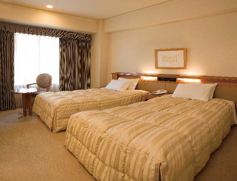 Courtyard By Marriott Shin-Osaka Station Hotel Szoba fotó A room at the hotel